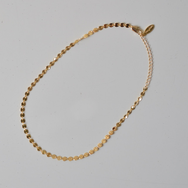 Coin plate choker