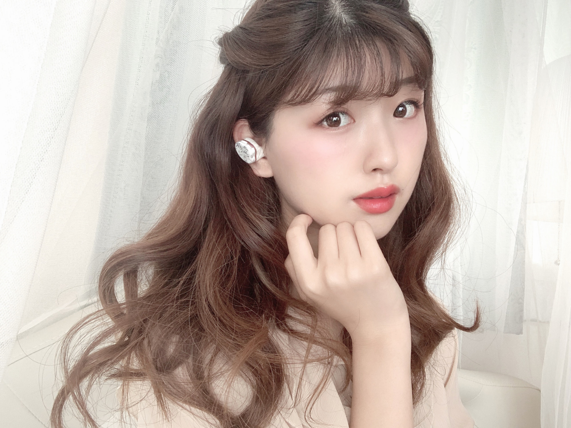 女の子のためのワイヤレスイヤホン？
